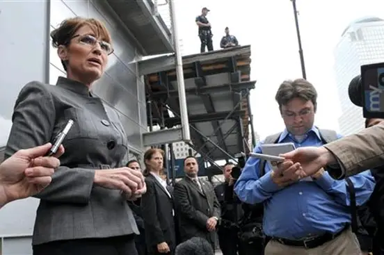 Palin talks to reporters outside Ladder 10